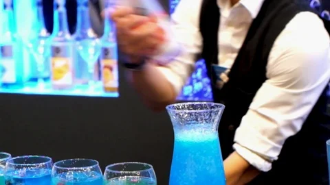 Professional bartender man juggling bottles and shaking cocktail at mobile bar Stock Footage 108310986