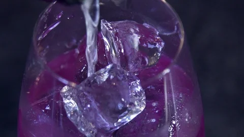 A professional bartender prepares a cocktail to drink for customers at the pub Video stock 85618344