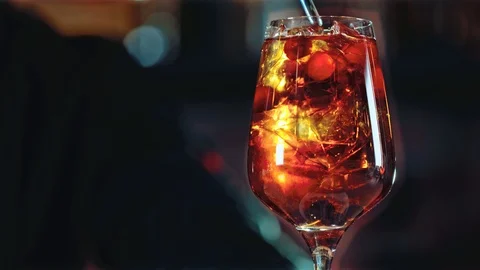 Professional bartender preparing a cocktail with ice Stock Footage 85602973