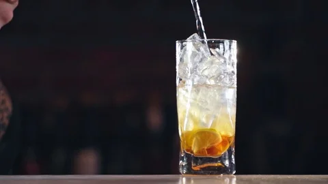 Professional bartender preparing a cocktail with ice Stock Footage 85603705