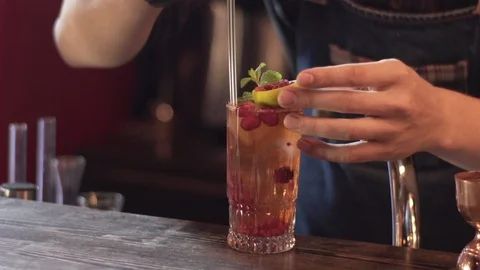 Professional bartender preparing cocktail with ice a mix of alcohol. Slow motion Stock Footage 96146776