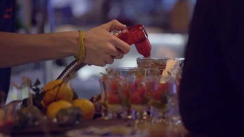 Professional bartender preparing a cocktail with ice a mix of alcohol. The Video stock 104491959