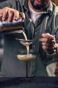 Professional bartender preparing a drink Stock Photos