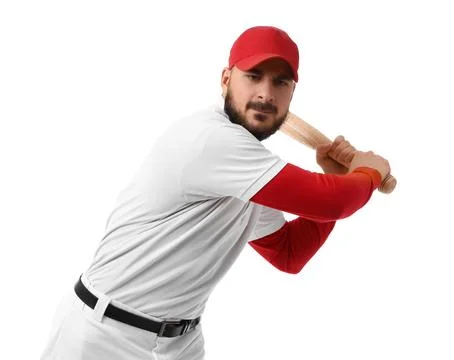 Professional baseball player in red cap and white uniform holding bat ready t Stock Photos