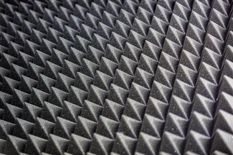 Professional black soundproofing with patterns. Stock Photos