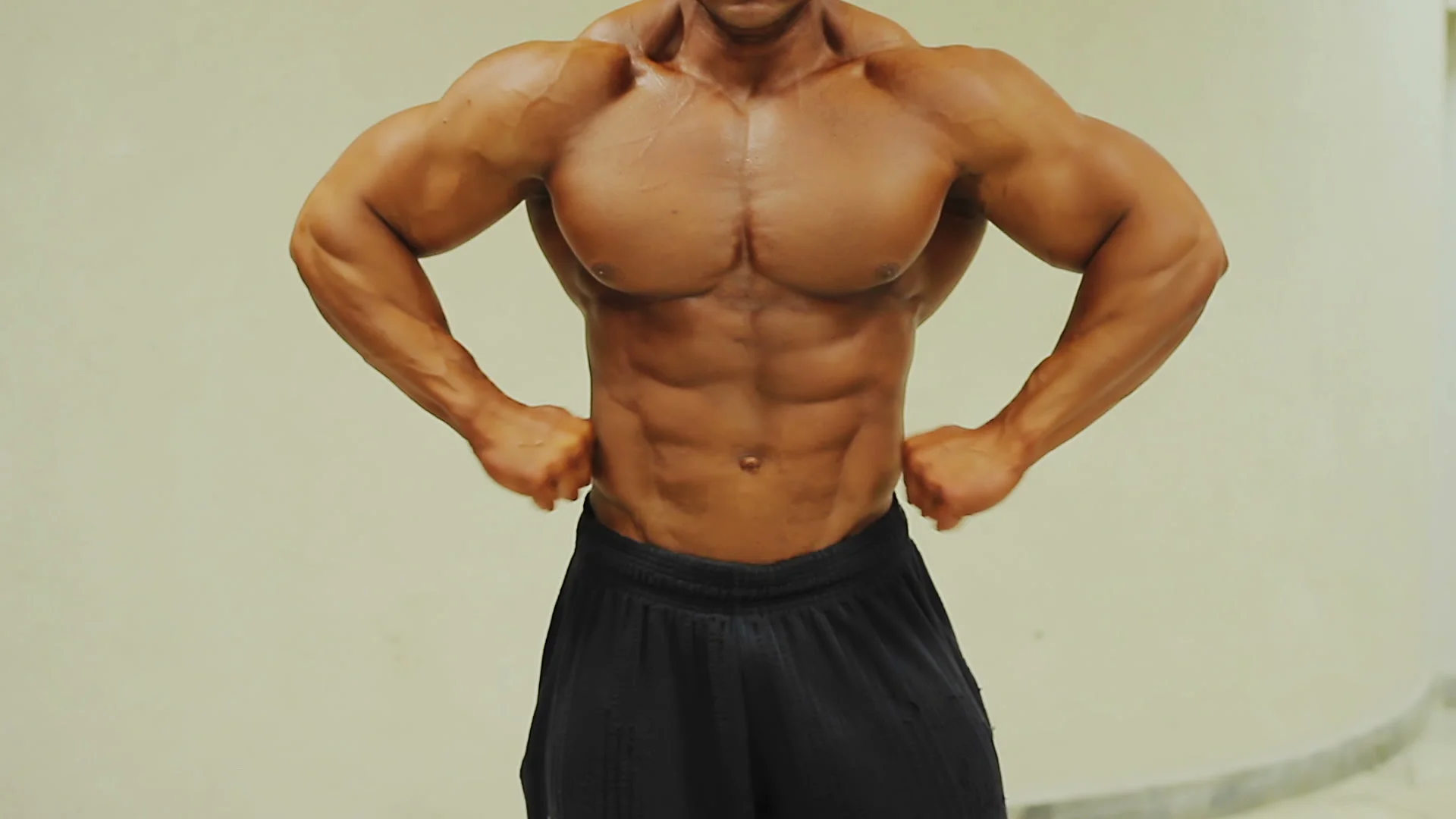 Male bodybuilder posing Stock Photo - Alamy