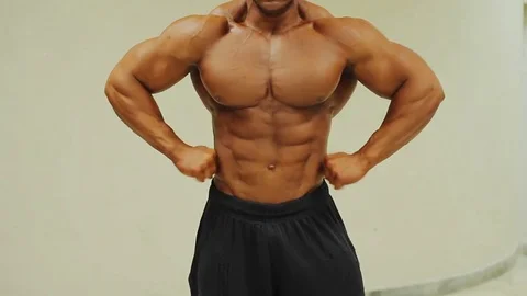 Bodybuilder Ryan Terry Teaches Strongman Eddie Hall How to Pose | BarBend