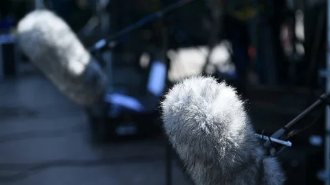 Professional boom microphone on a television set 스톡 동영상 91574495