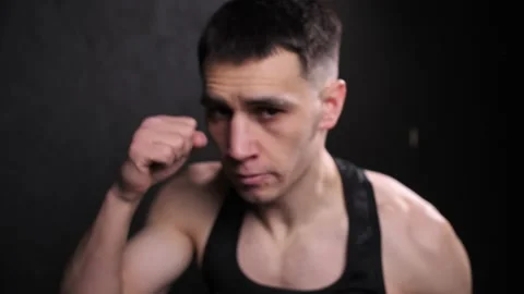 Professional boxer without gloves throws a series of punches Stock Footage 147024972
