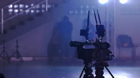 Professional broadcast camera installed on a tripod at a live event Stock Footage 113132928