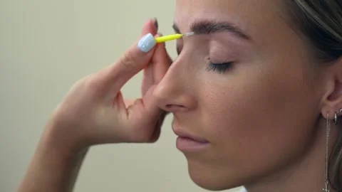 Professional brows lamination process with beautiful girl. Stock Footage 258553695