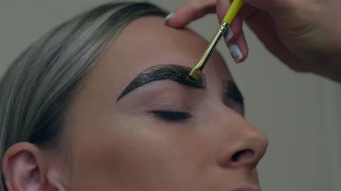Professional brows lamination process with beautiful girl. Stock Footage 258553748