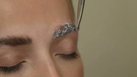 Professional brows lamination process with beautiful girl. Stock Footage 258553794