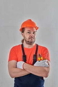 A professional builder came to make repairs in the apartment Stock Photos