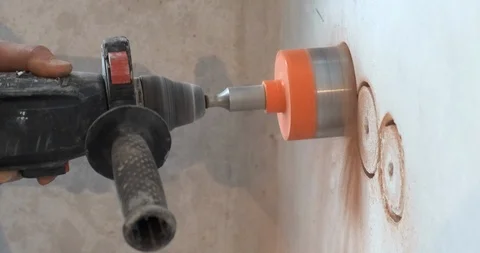 Professional builder drill recess in brick wall, deep hole, perforator, red dust Stock Footage 124295752