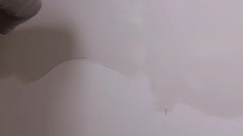 Professional builder with spatula Applies Plaster To The Wall Stock Footage 101382926