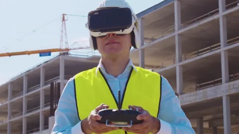 Professional builder standing in front of construction site. Foreman in hardhat Stock Footage 307938073