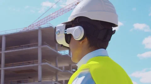 Professional builder standing in front of construction site. Foreman in hardhat Stock Footage 307938571