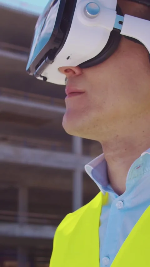 Professional builder standing in front of construction site. Foreman in hardhat Stock Footage 308936653