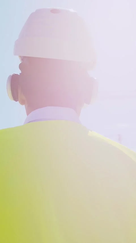 Professional builder standing in front of construction site. Foreman in hardhat Stock Footage 308936868