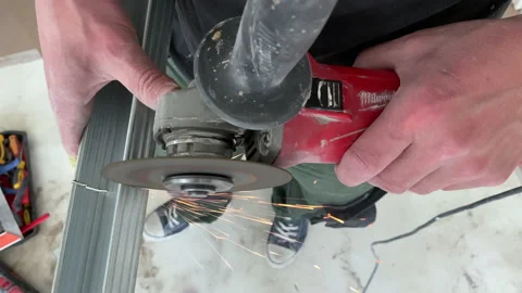 Professional builder worker cutting metal profile Video stock 154723328