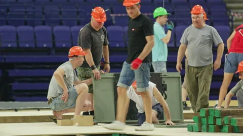 Professional builders with taskmaster work upon swim pool Stock Footage 238932223