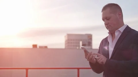 Professional Businessman Using Mobile Phone, Texting SMS Smartphone City Urban Video stock 96506531