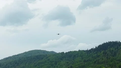Professional Camera Drone Flying in the Sky Stock Footage 343464105