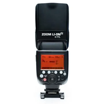 Professional Off camera flash with display on white background with a stand used Stock Photos