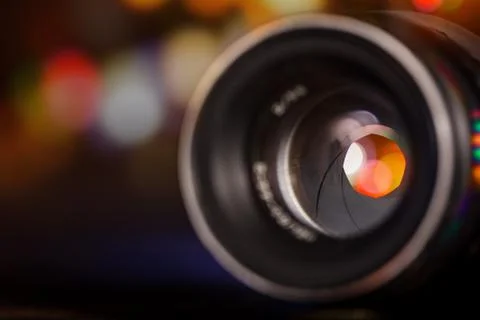 Professional camera lens with reflections. Stock Photos