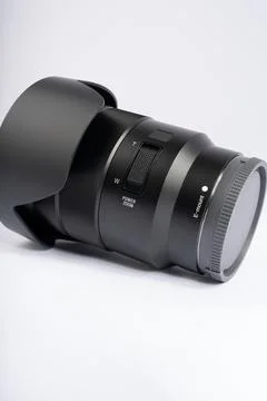 Professional camera lens on white background. Modern photography equipment .. Stock Photos