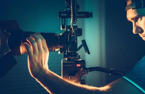 Professional Camera Operator with Pro Digital Equipment Taking Video Shots 写真素材