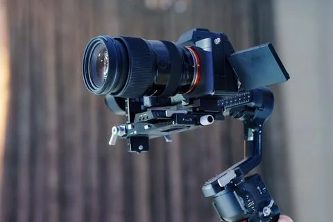 Professional camera setup on electronic gimbal stabilizer Stock Photos