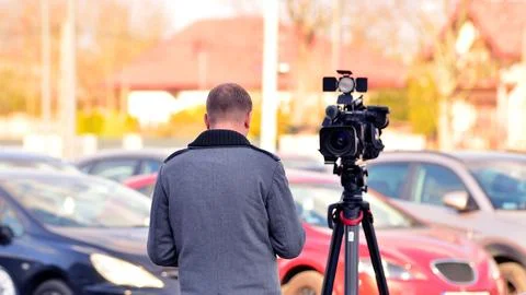 Professional camera taking TV interviewer. Stock Photos