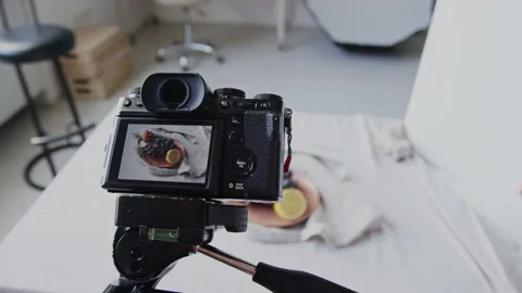 Professional Camera on Tripod above Table with Props Stock Footage 318723455