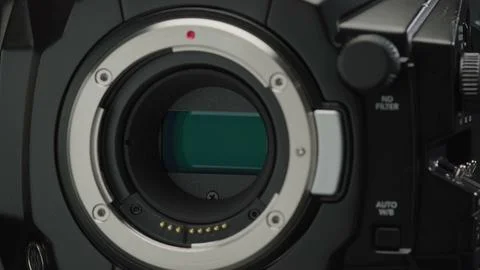 The professional camera's lens mount precisely holds the sensor. 写真素材