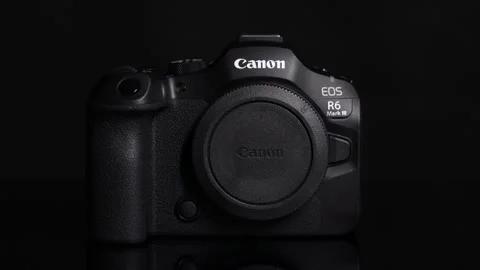 Professional Canon EOS R6 Mark III Mirrorless Camera Body on Black Background Stock Footage 340005224