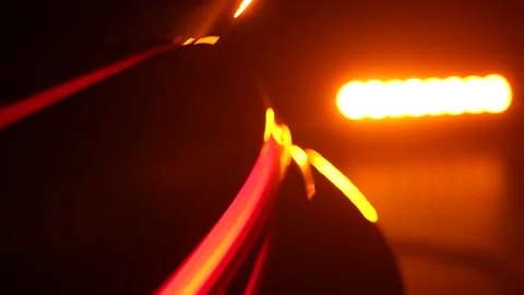 Professional car design video capturing glowing rear light detail of modern s Stock Footage 323969845