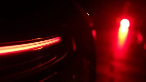 Professional car design video capturing sleek rear light detail of luxury spo Stock Footage 323969899