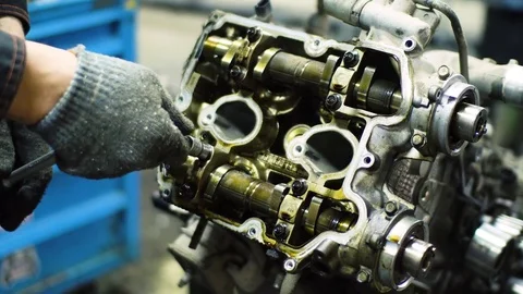 Professional car mechanic fix engine Stock Footage 73283957