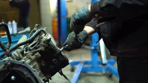 Professional car mechanic fix engine Stock Footage 73284111