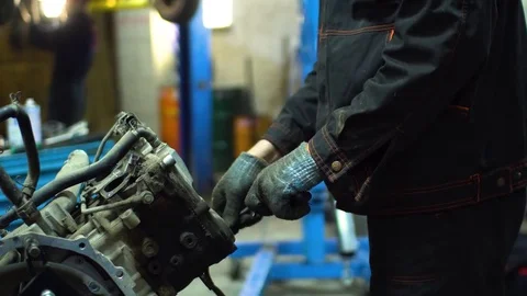 Professional car mechanic fix engine Stock Footage 73284191