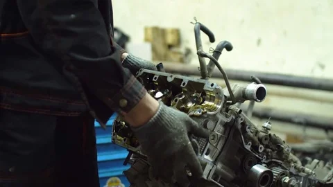 Professional car mechanic fix engine Stock Footage 73285450