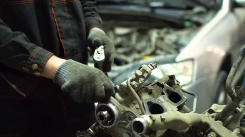 Professional car mechanic fix engine Stock Footage 73285721