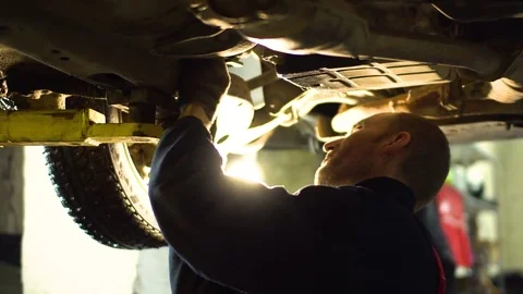 Professional car mechanic fix engine Stock Footage 73285919