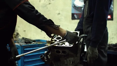 Professional car mechanic fix engine Stock Footage 73286087