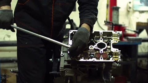 Professional car mechanic fix engine Stock Footage 73296421