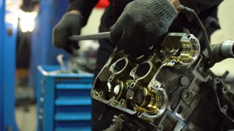 Professional car mechanic fix engine Stock Footage 73296423