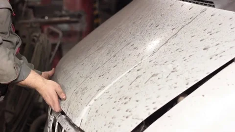 Professional car mechanic working in auto repair services car Stock Footage 73899682