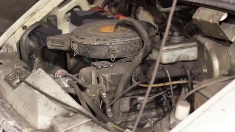 Professional car mechanic working in auto repair services car Stock Footage 73899739